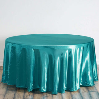 Elevate Your Event Decor with the 120" Turquoise Seamless Satin Round Tablecloth Elevate Your Event Decor with the 120" Turquoise Seamless Satin Round Tablecloth