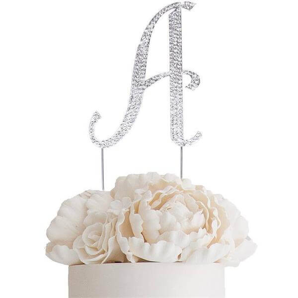 Silver glitter letter "A" cake topper with white peony flowers