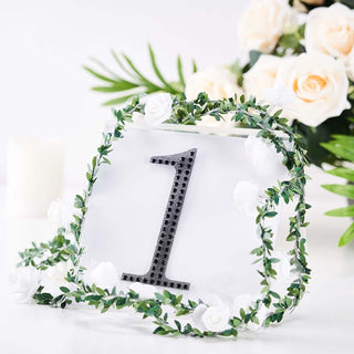 Table number sign with floral decoration for events and weddings.