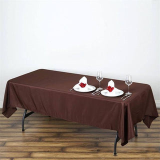 Add Elegance to Your Event with the 60"x102" Chocolate Seamless Polyester Rectangular Tablecloth