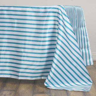 Elevate Your Event Decor with the 60x126 White/Turquoise Seamless Stripe Satin Rectangle Tablecloth