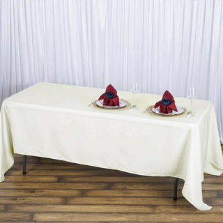 Elevate Your Event with the Ivory Premium Polyester Rectangular Tablecloth Elevate Your Event with the Ivory Premium Polyester Rectangular Tablecloth