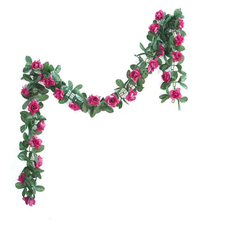 Artificial pink rose garland on white background