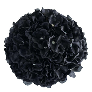Black floral ball arrangement on a plain white background.