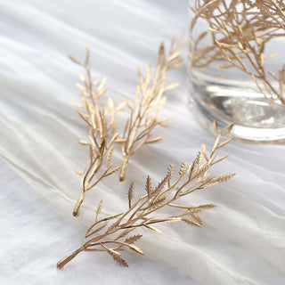 Create Stunning Table Centerpieces with Mini Metallic Gold Artificial Fern Leaf Branch Stems Create Stunning Table Centerpieces with Mini Metallic Gold Artificial Fern Leaf Branch Stems
