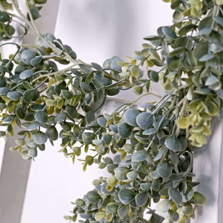 Artificial greenery garland with lush green leaves