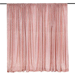 Shimmering rose gold sequin curtain draped elegantly.