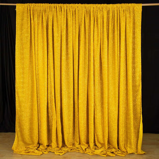 Shimmering gold sequin backdrop for events and photo shoots.