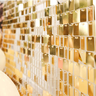 Colorful gold paint swatches displayed on a wall.