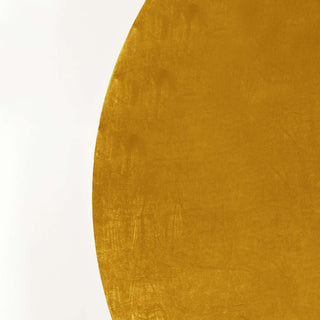 Golden circular fabric texture on a plain background.