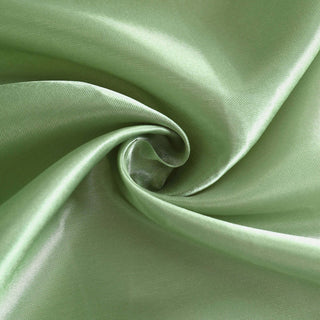 Smooth green satin fabric showcasing luxurious texture and sheen.