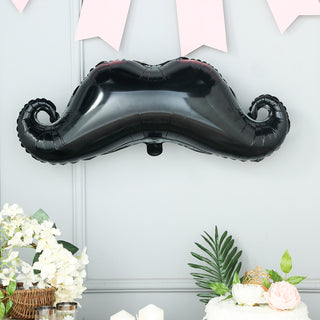 Add a Touch of Fun and Flair with our 31" Black Mustache Shaped Mylar Balloon