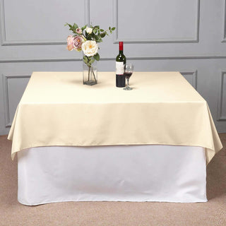 Elevate Your Event Decor with the Beige Square Polyester Tablecloth Elevate Your Event Decor with the Beige Square Polyester Tablecloth