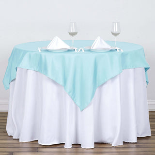 Add Elegance to Your Events with the 54x54 Light Blue Square Polyester Table Overlay Add Elegance to Your Events with the 54x54 Light Blue Square Polyester Table Overlay