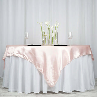 Transform Your Tables with the Blush Satin Square Tablecloth Overlay Transform Your Tables with the Blush Satin Square Tablecloth Overlay
