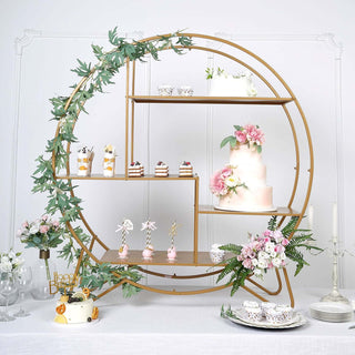 Elegant dessert display with a cake and treats on a gold circular shelf.