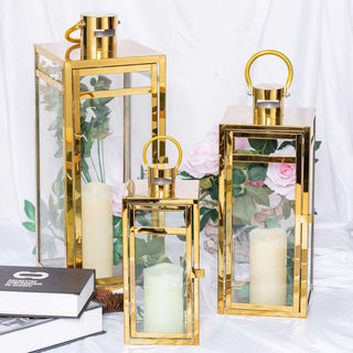 Gold lanterns with candles, perfect for home decor.