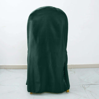 Green chair cover on a white backdrop