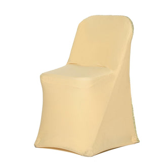 Yellow slipcover chair on a white background.