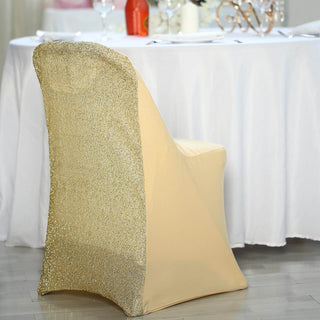 Gold sequin chair cover on an elegant dining setting.