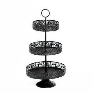 Black three-tiered serving stand with intricate lace design.