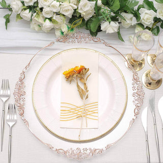 Elegant dining table setting with floral decor and fine china.