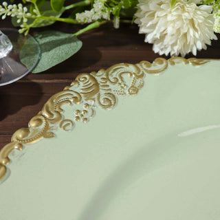 Elegant mint green plate with gold decorative rim on a wooden surface.