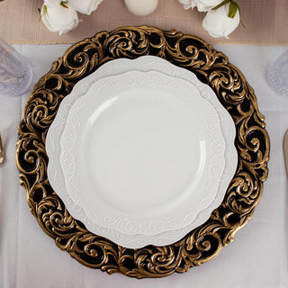 Elegant white dinner plate on ornate gold charger, perfect for table settings.