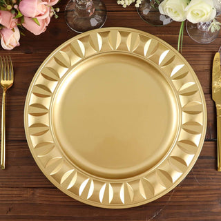 Gold decorative charger plate on a wooden table with floral accents.