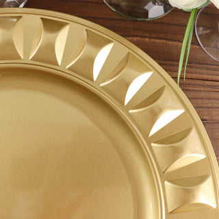 Gold decorative charger plate on wooden table.
