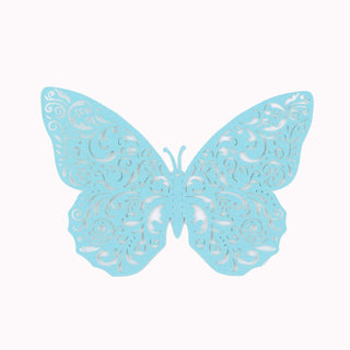 Intricate blue butterfly cutout design on a plain background.