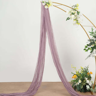 Lavender sheer fabric draped elegantly in a floral arrangement