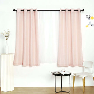 Pink sheer curtains hanging in a bright, modern living space.