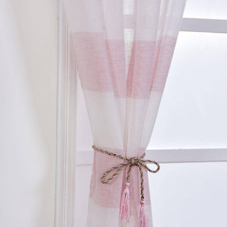 Pink striped sheer curtain with braided tieback.