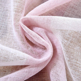 Pink linen fabric with a soft, textured appearance.