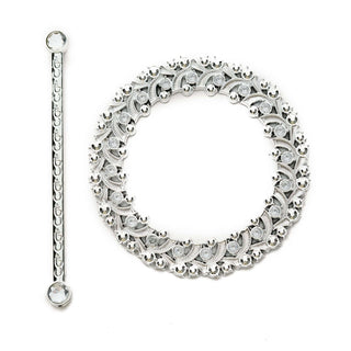 Silver decorative jewelry set with intricate detailing