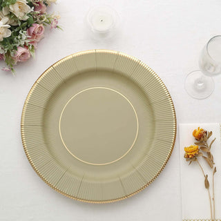 Elegant green charger plate with gold rim detail on a white table setting.