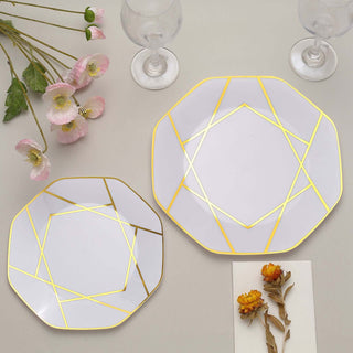 Elegant geometric dinner plates with gold accents on a neutral background.