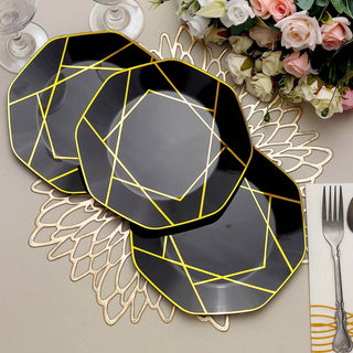 Black octagonal plates with geometric yellow patterns on a decorative table setting.