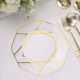 Gold geometric decorative plate on a white table setting.
