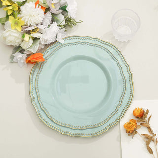 Elegant mint green plate with gold trim, surrounded by floral decor.