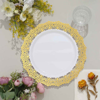 Elegant gold lace decorative plate on a neutral table with flowers.