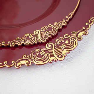 Elegant red plate with intricate gold detailing.