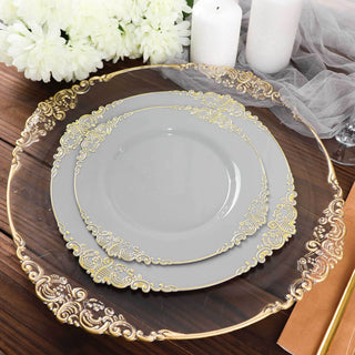 Elegant gray plate with gold detailing on a decorative charger plate.