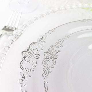 Elegant clear plate with intricate silver detailing