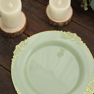 Elegant green plate with gold detailing, styled with candles and rustic decor.