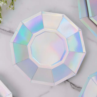 Iridescent octagonal plate on a marble surface.