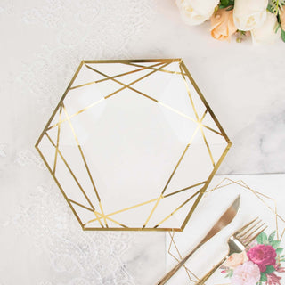 Geometric hexagon plate with gold accents on a marble surface.