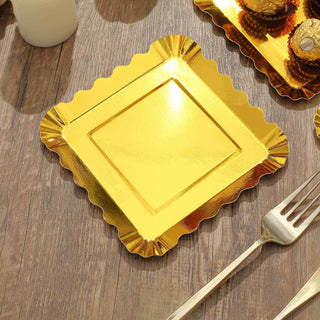 Gold scalloped dessert plate on wooden table.