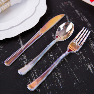 Silver stainless steel cutlery set including knife, fork, and spoon.